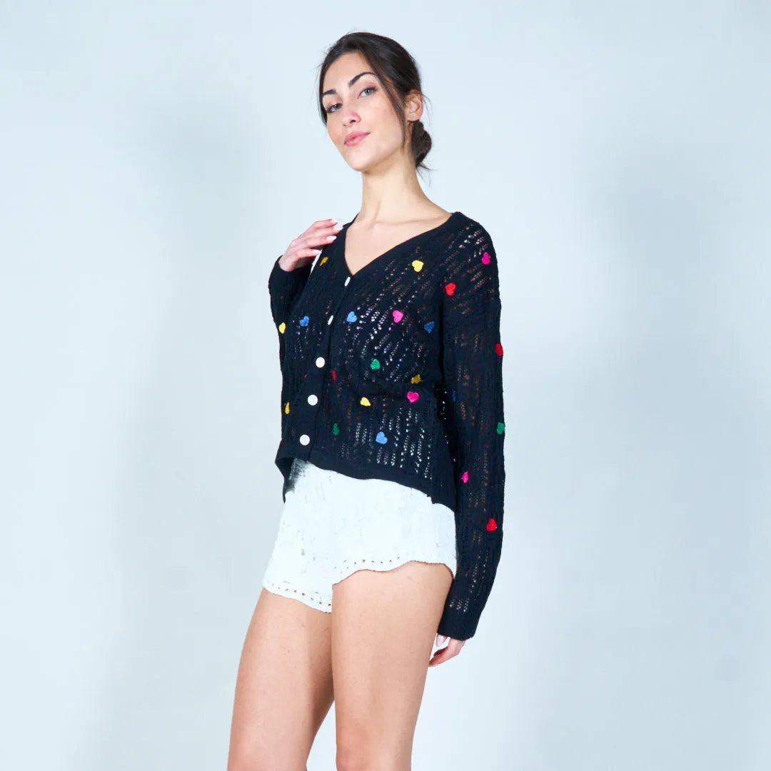 Open-knit cardigan with heart accents wholesale